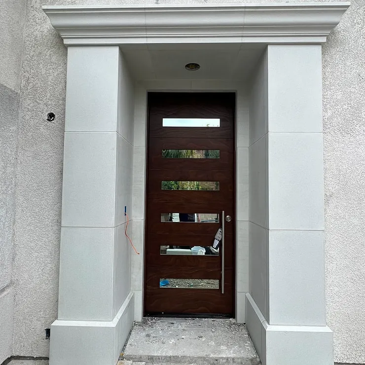 modern-wood-door-stone-trim-min